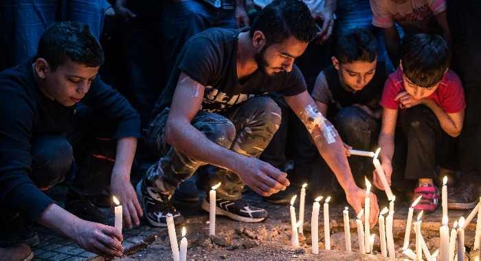 A candle vigil for victims of the previous day's twin bombings, southern Beirut, November 13, 2015. Eduardo Lima/Demotix/Corbis