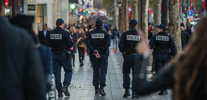 French police patrol the Champs Elysees, Paris, November 15, 2015