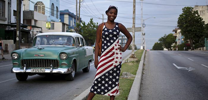 Cuban woman poses wearing an American flag dress, Havana, Aug. 4, 2015. Enrique de la Osa/Reuters/Corbis