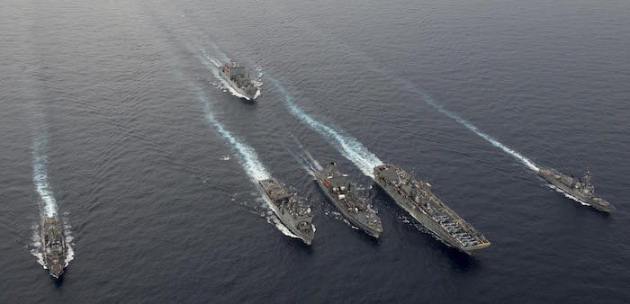 U.S. Navy ships steaming in formation during a drill in the South China Sea, Oct. 13, 2016. Will Gaskill/United States Navy