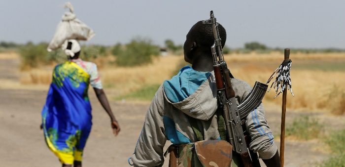 An armed man close to the village of Nialdhiu, South Sudan, Feb. 7, 2017. Siegfried Modola/Reuters