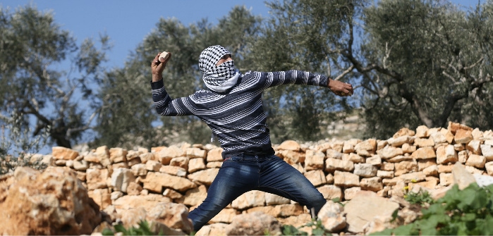 Palestinian protester during clashes with Israeli troops in West Bank, Kofr Qadom, Feb. 10, 2017. Mohamad Torokman/Reuters